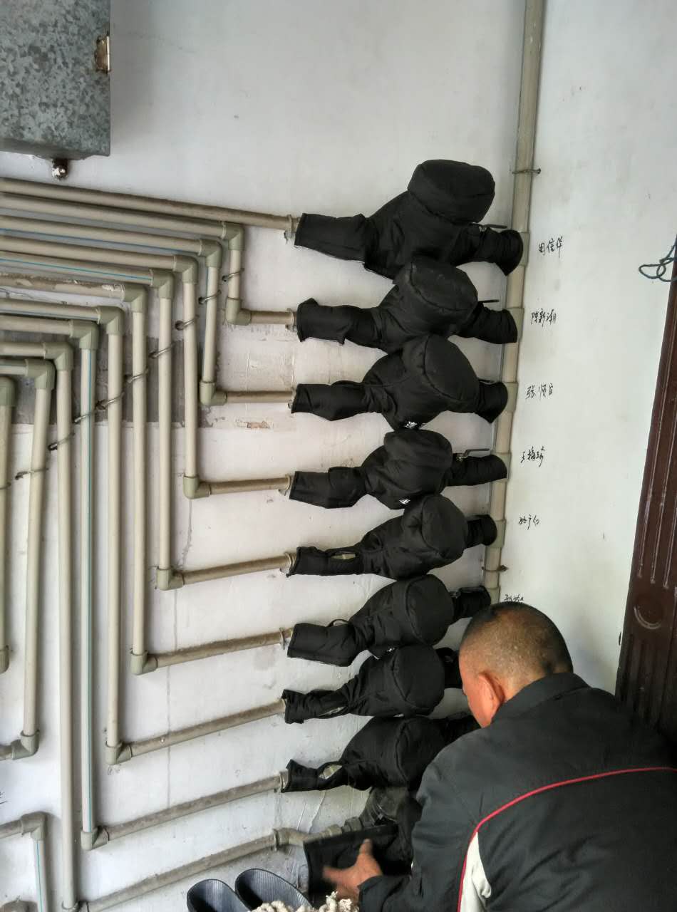 583bc6c11229b.jpg 防冻水表包扎试点工作.jpg